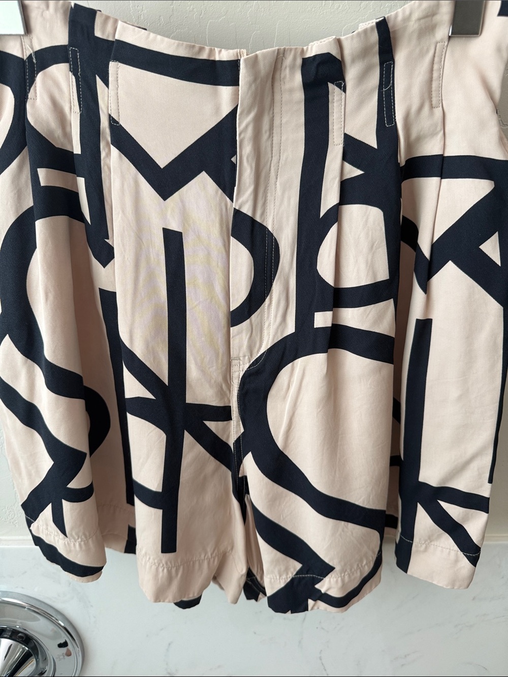 H&M Beige Skater Skirt with Bold Black Graphic Print